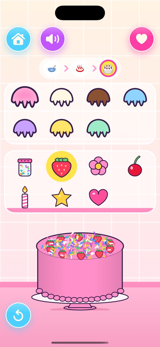 A pink iced cake covered in sprinkles and strawberries